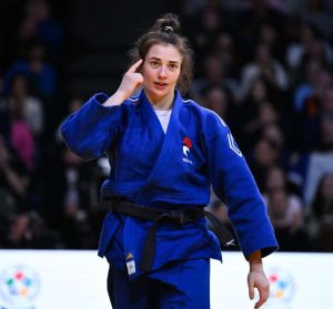 A women with a Judo Gi